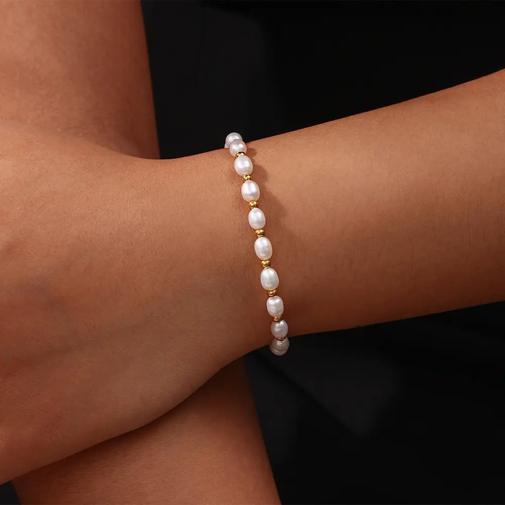 Elegante armband met parels in goud