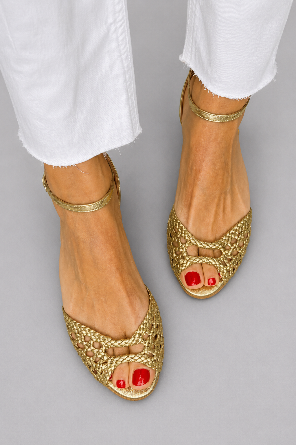 Isadora gevlochten sandalen in goud