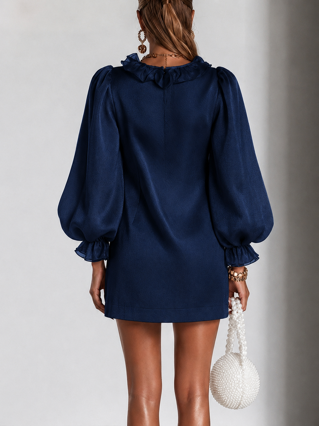 Losse mini-jurk met gesmokte pofmouwen in marineblauw