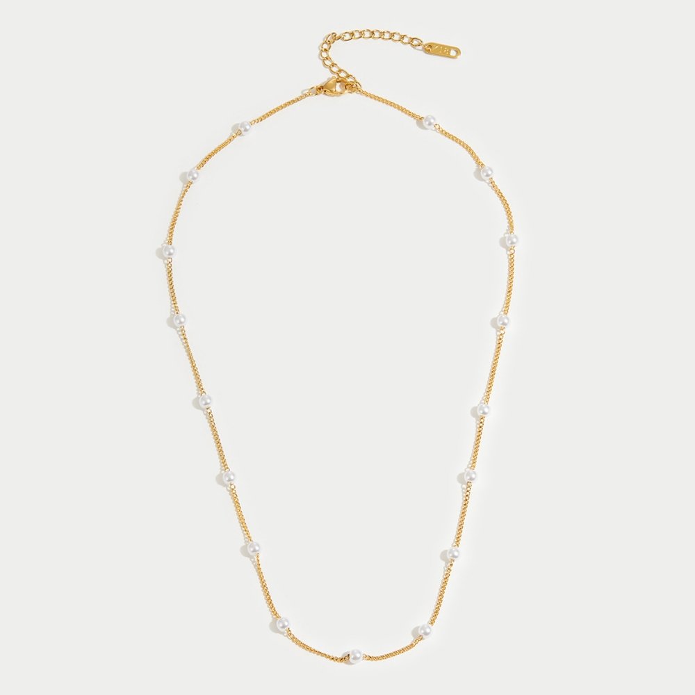 Tijdloze ketting met gouden parels