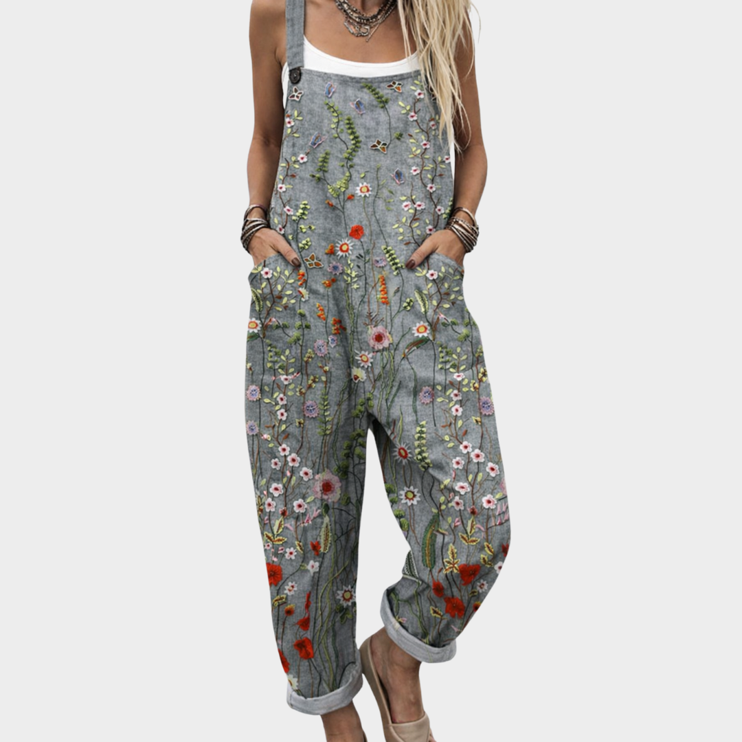Wieteke grijze jumpsuit met kleurrijke bloemenprint