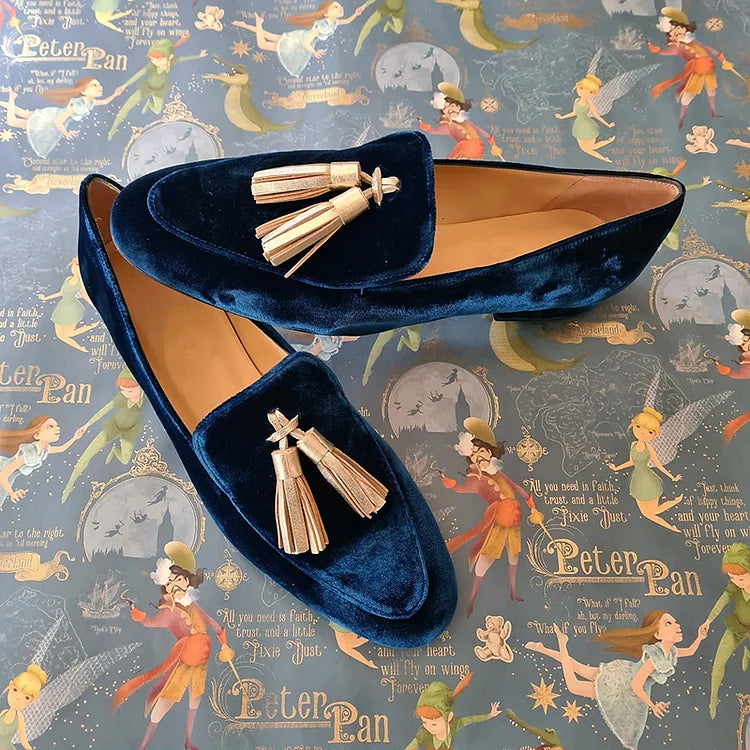 Donkerblauwe loafers met champagnekleurige kwastjes