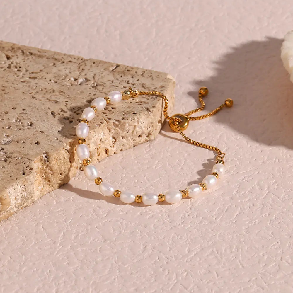 Elegante armband met parels in goud