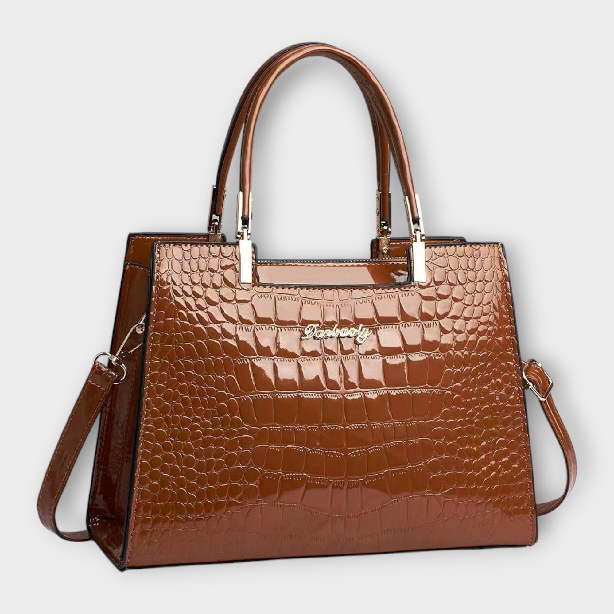 Glanzende handtas met krokodillenprint