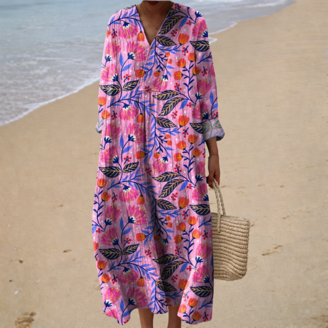 Nelly jurk met bloemenprint in fuchsia en blauw
