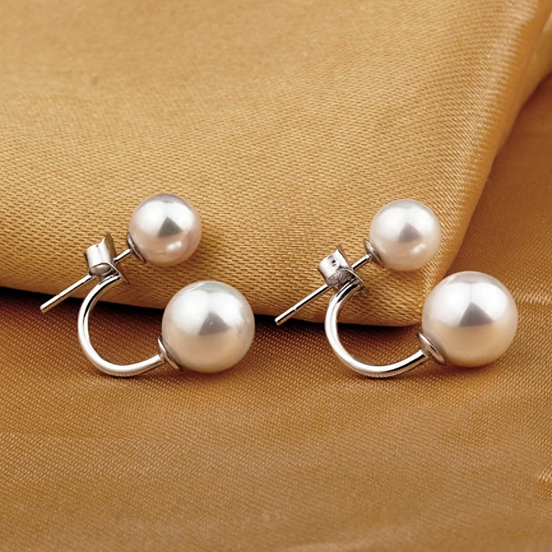 Statement oorbellen met dubbele parel