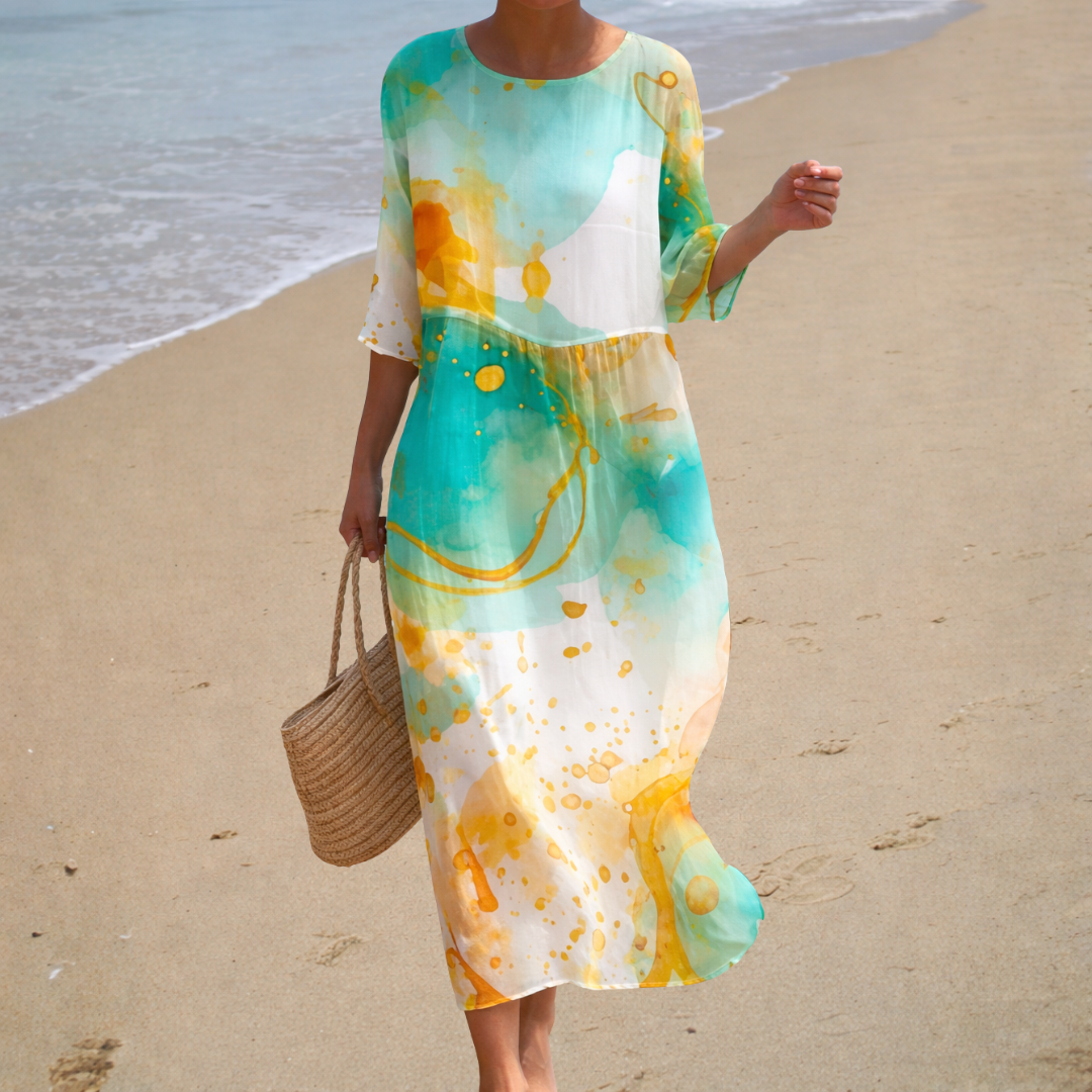 Hermien jurk met aquarelprint in turquoise
