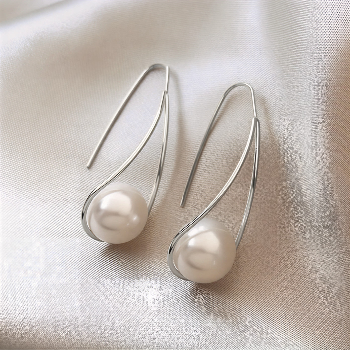 Elegante oorbellen met mystieke parel