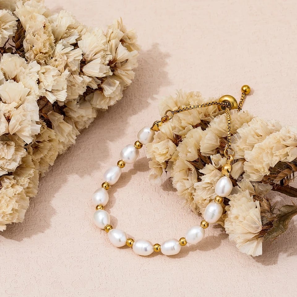 Elegante armband met parels in goud