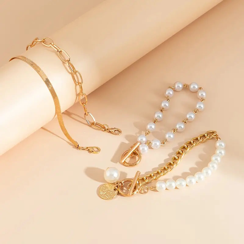 Luxe set gelaagde parelarmbanden