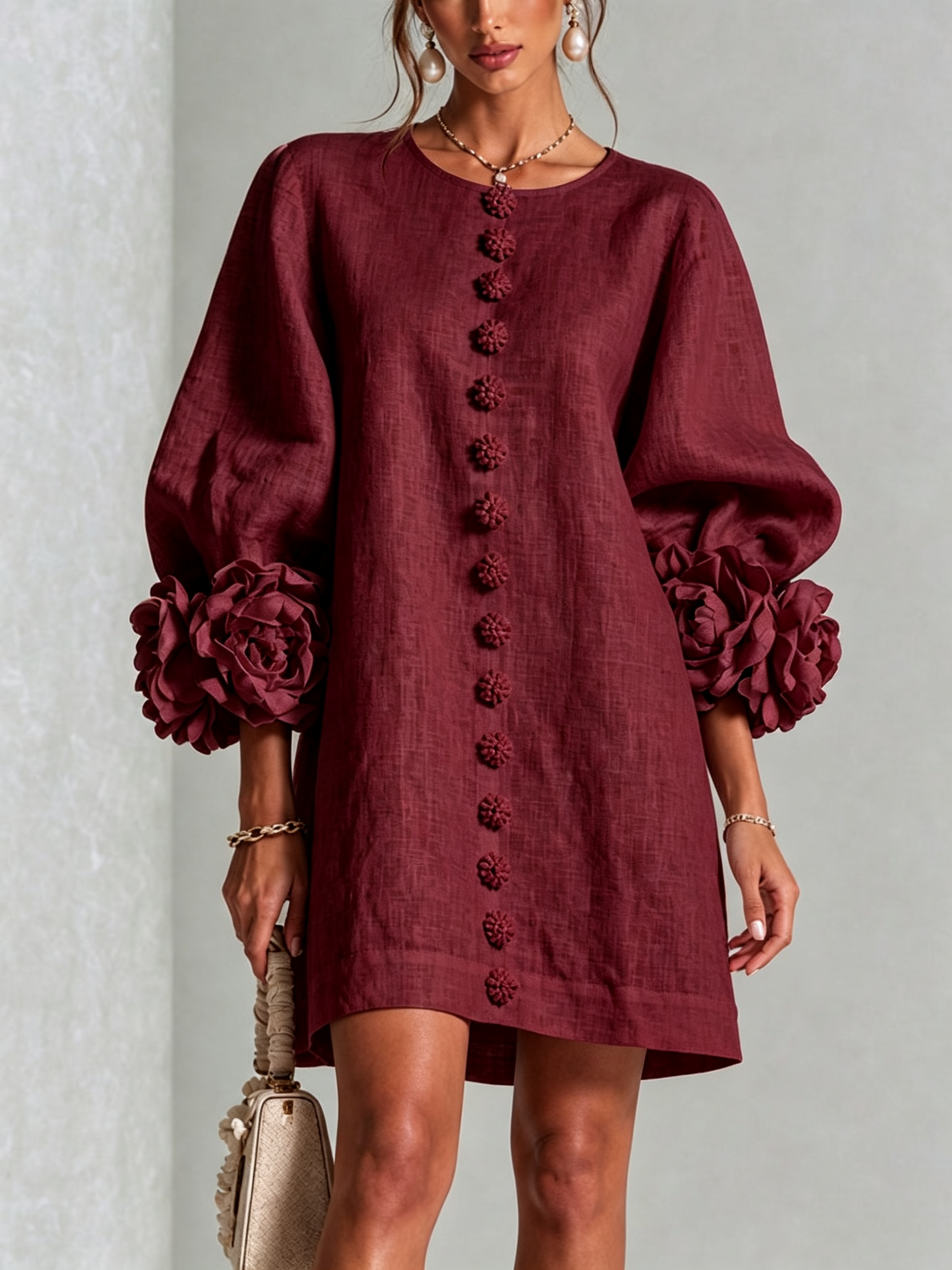 Anita mini-jurk met rozen aan de manchetten in bordeaux