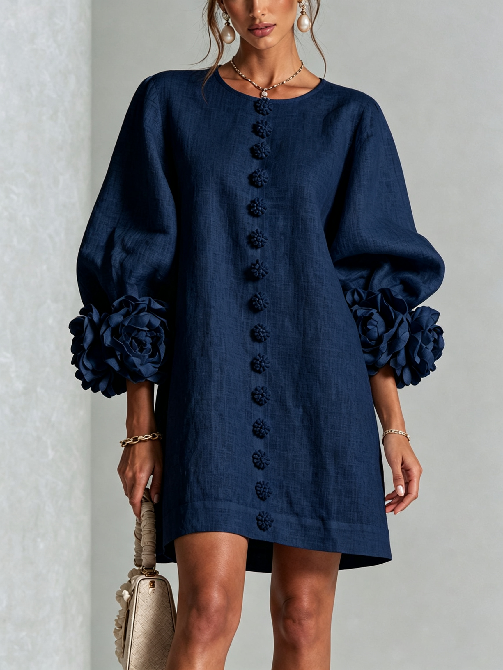 Anita mini-jurk met rozen aan de manchetten in marineblauw