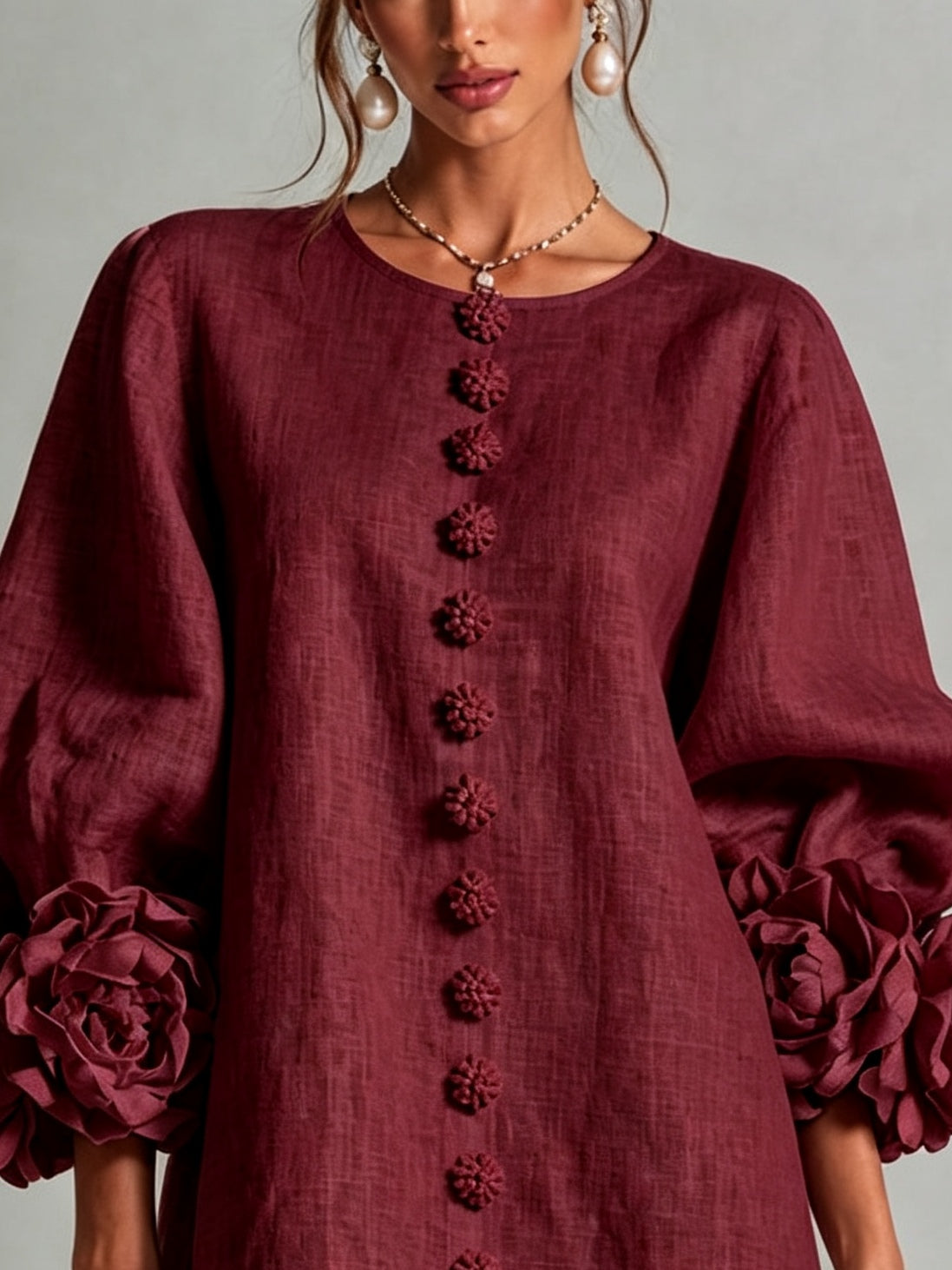 Bordeauxrode mini-jurk met knopen en bloemenprint