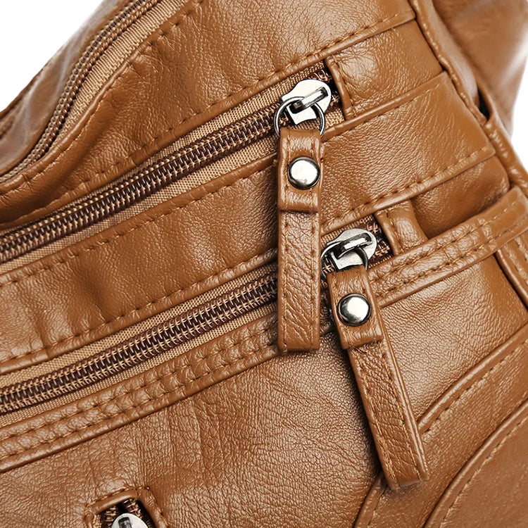 Hillie schoudertas, detail van de vakken