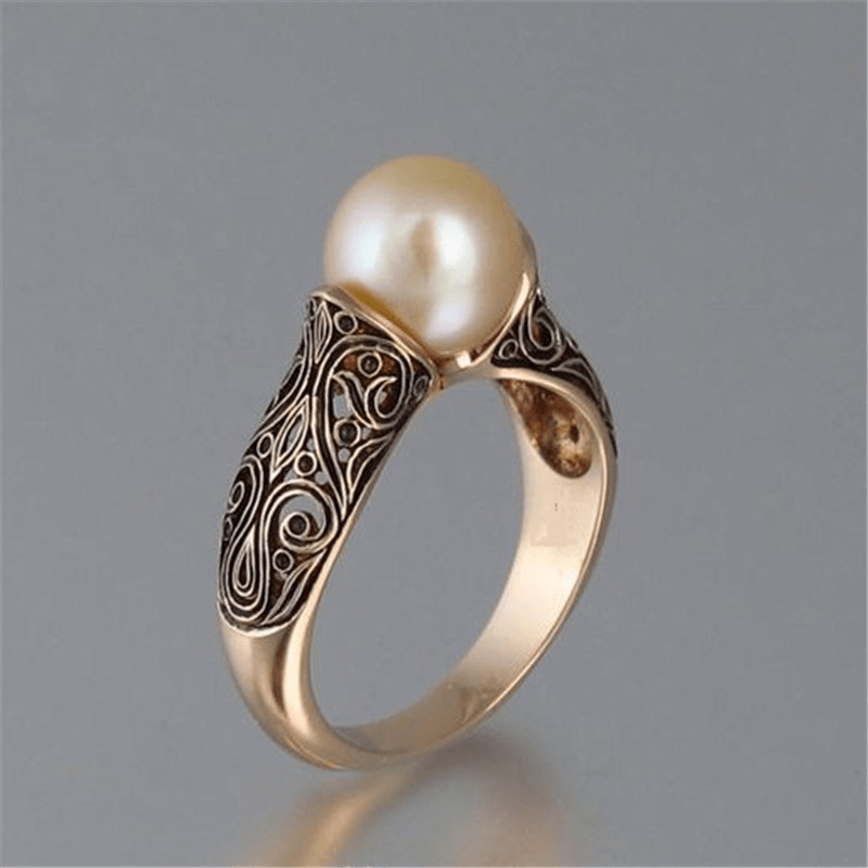 Vintage ring met gouden parel