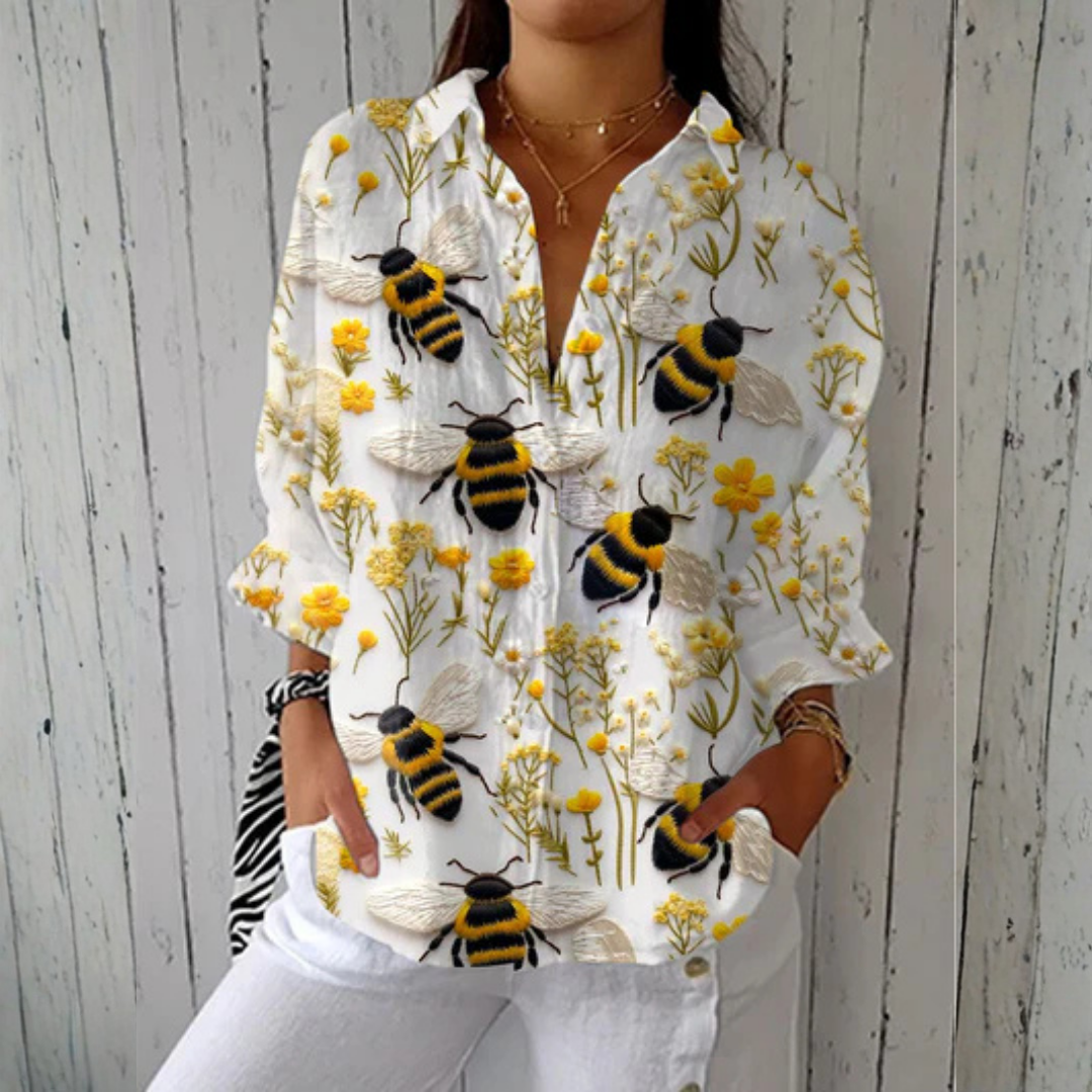 Nathalie | Blouse met gouden bij
