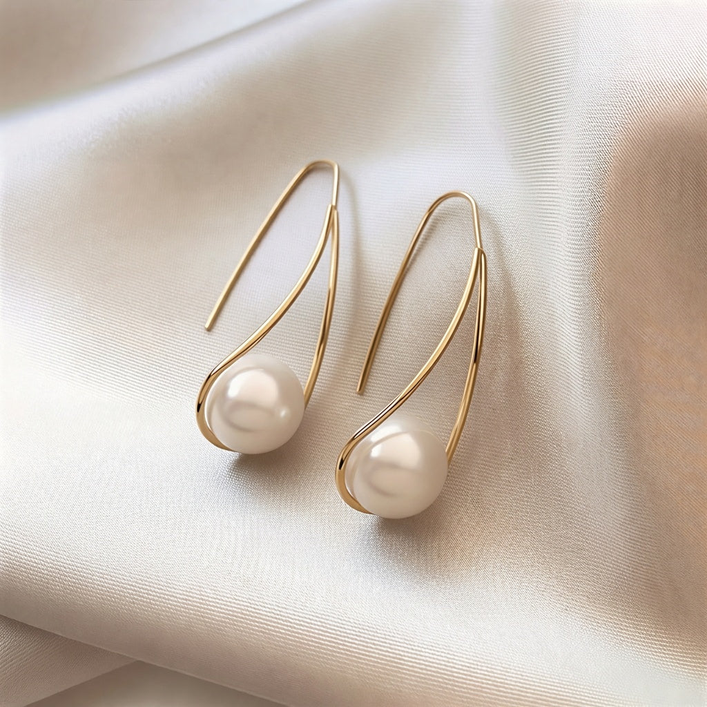 Elegante oorbellen met mystieke parel