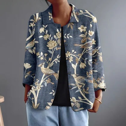 Oriella luchtige blouse met vogels en bloeiende takken op blauw