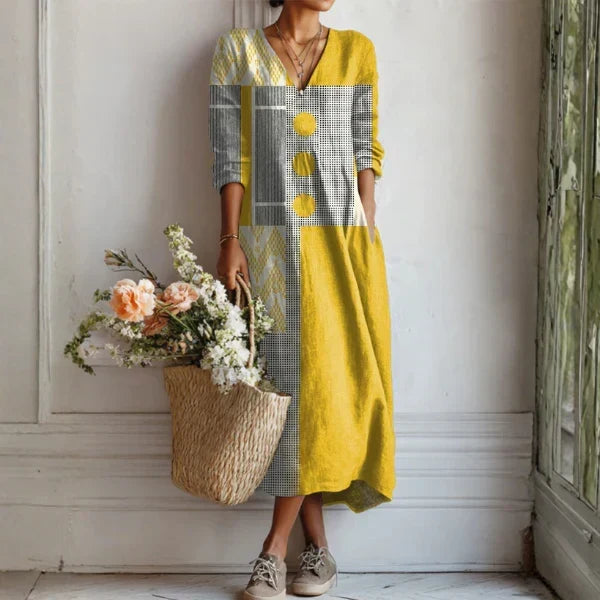 Rosalía | Lange jurk met knopen en kleurrijke print