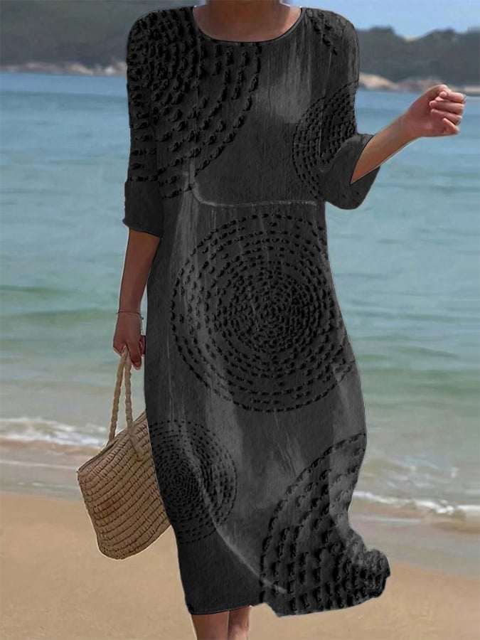 Trijntje | Zwarte strandjurk met cirkelreliëf
