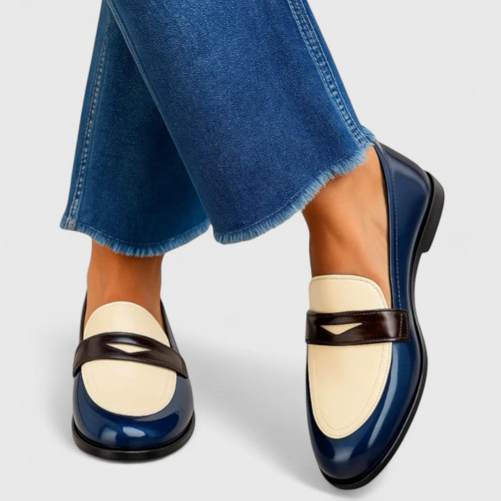 Trixie elegante loafers in marineblauw met crème