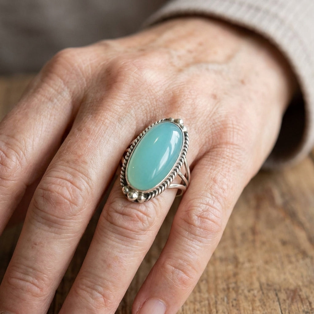 Noemi ring met turkoois en gevlochten band