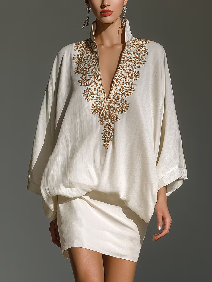 Witte set met tuniek en mini-rok